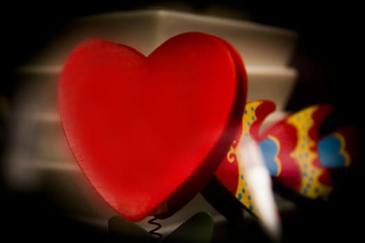 Red shape heart on white plate background
