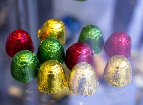 Small chocolates wrapped in metallic paper
