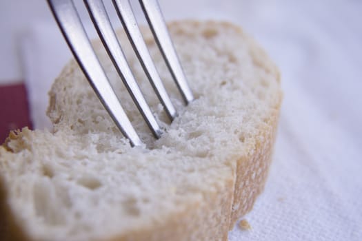 Piece of bread and a fork