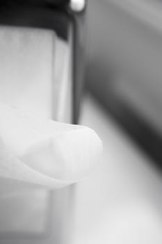 Napkin coming out of a napkin maker