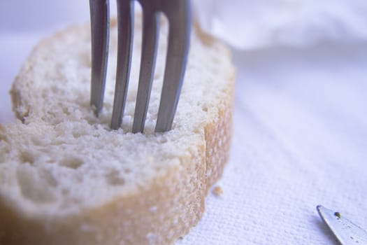 Piece of bread and a fork