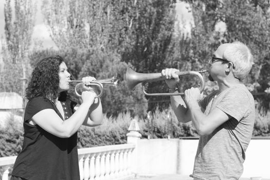 trumpet, man, white, player, black, room, saxophone, people, female, playing, adult, male, play, two, couple, music, instrument, performer, blower, trumpeter, woman, musician, person, girl, portrait, face, hair, golden, holding, hands, musical