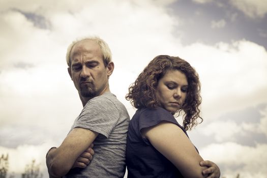 Couple in negative attitude angry transmitting emotional tension