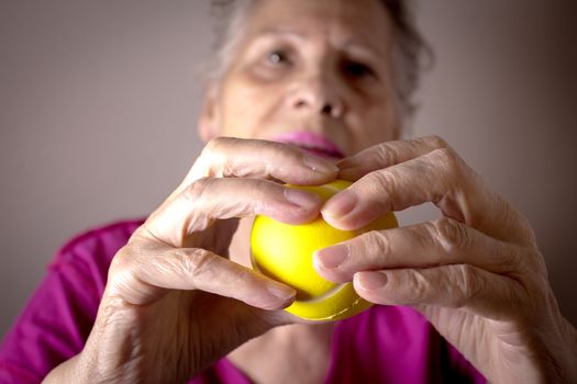 Rehabilitation exercises for an older woman with cerebral stroke