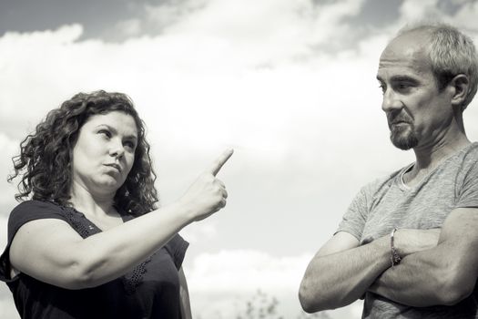 Couple in negative attitude angry transmitting emotional tension