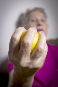 Rehabilitation exercises for an older woman with cerebral stroke