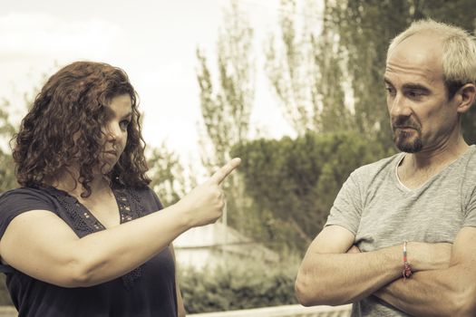 Couple in negative attitude angry transmitting emotional tension