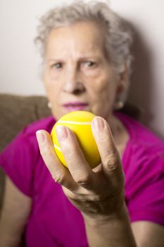 Rehabilitation exercises for an older woman with cerebral stroke