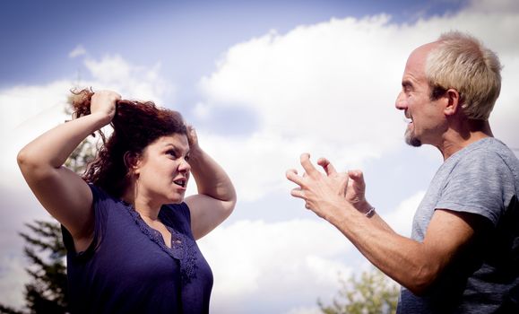 Couple in negative attitude angry transmitting emotional tension