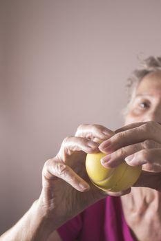 Rehabilitation exercises for an older woman with cerebral stroke