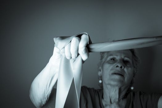 Rehabilitation exercises for older women with elastic band