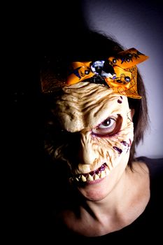 Portrait of a zombie woman at halloween party