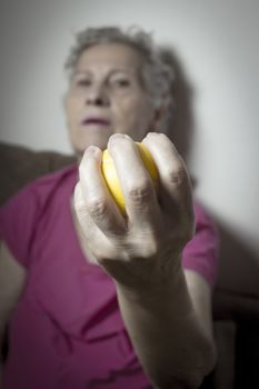 Rehabilitation exercises for an older woman with cerebral stroke