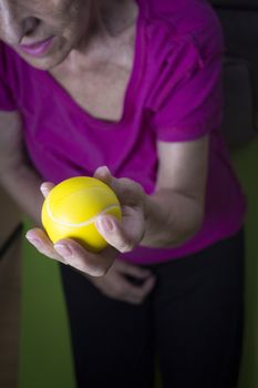 Rehabilitation exercises for an older woman with cerebral stroke