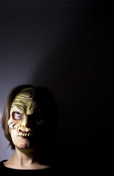 Portrait of a zombie woman at halloween party