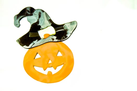Pumpkin with face drawn for halloween.