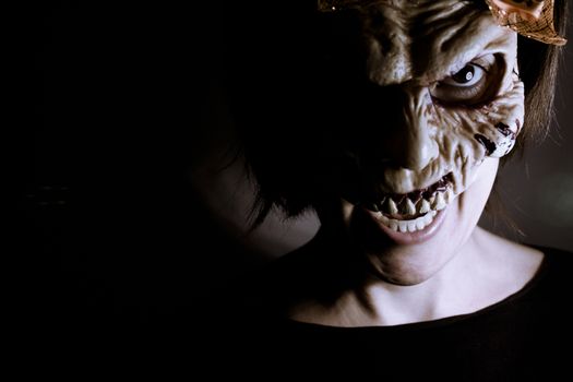 Portrait of a zombie woman at halloween party