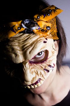 Portrait of a zombie woman at halloween party