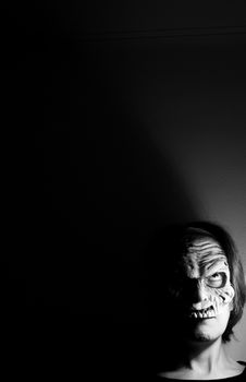 Portrait of a zombie woman at halloween party