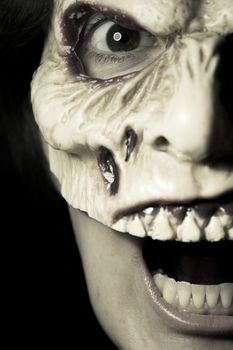 Portrait of a zombie woman at halloween party