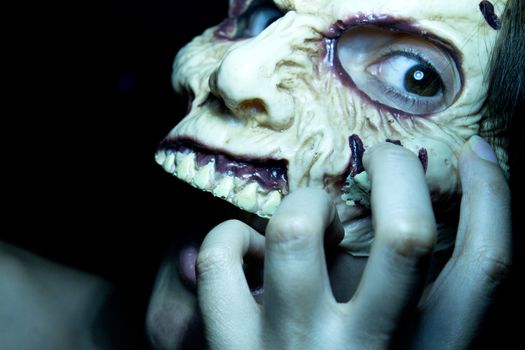 Portrait of a zombie woman at halloween party