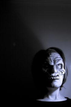 Portrait of a zombie woman at halloween party