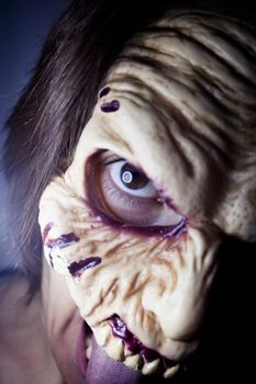 Portrait of a zombie woman at halloween party