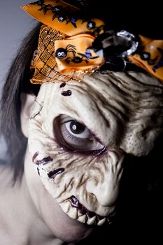 Portrait of a zombie woman at halloween party