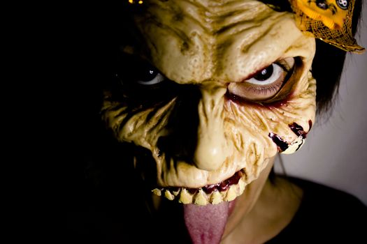 Portrait of a zombie woman at halloween party
