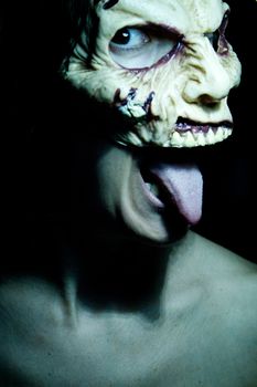 Portrait of a zombie woman at halloween party