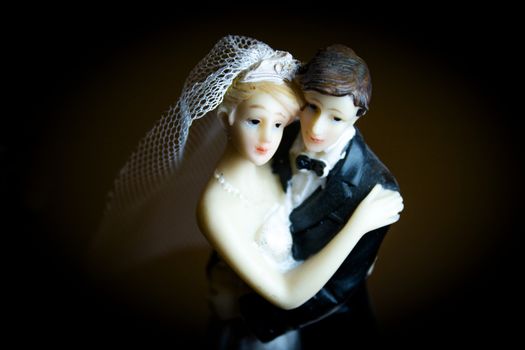 Figure of happy newlyweds. It does not have a specific author, it does not need model release
