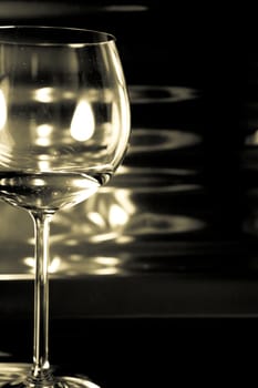 Glass of red wine in nightclub. No people
