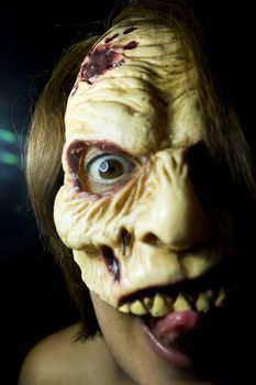 Portrait of a zombie woman at halloween party
