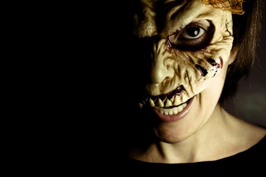Portrait of a zombie woman at halloween party