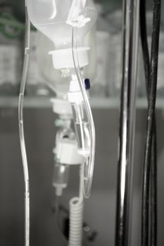 Plastic bottle of serum in surgical operation