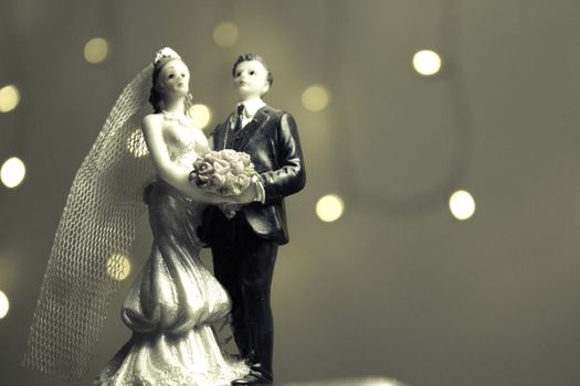Figure of happy newlyweds. It does not have a specific author, it does not need model release