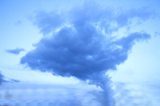 Sky with clouds that draw shapes. Tranquil and peaceful scene