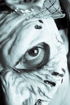 Portrait of a zombie woman at halloween party