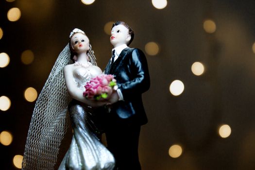 Figure of happy newlyweds. It does not have a specific author, it does not need model release