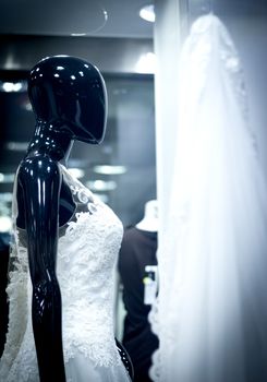 Part of a generic wedding dress. No people
