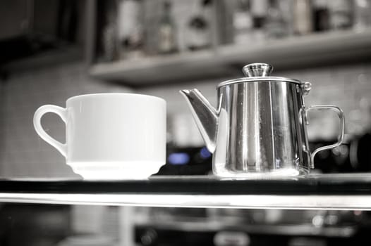 Whhite coffee cups on glass counter