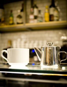 Whhite coffee cups on glass counter