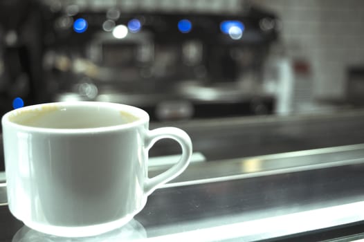 Whhite coffee cups on glass counter