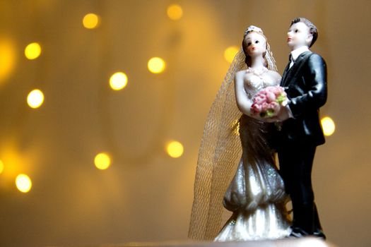 Figure of happy newlyweds. It does not have a specific author, it does not need model release