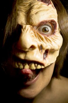Portrait of a zombie woman at halloween party