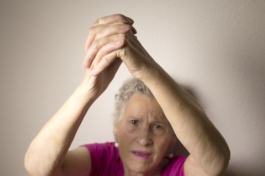Rehabilitation exercises for an older woman with cerebral stroke