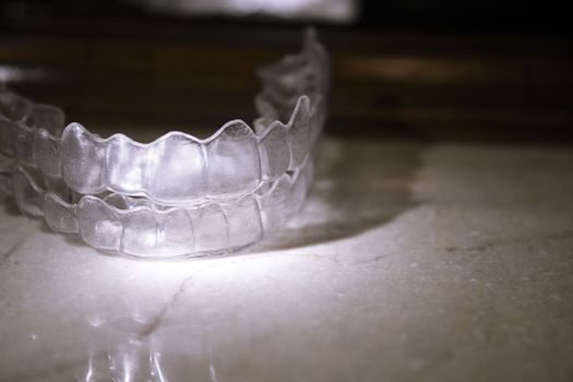 Invisible orthodontics to align the teeth