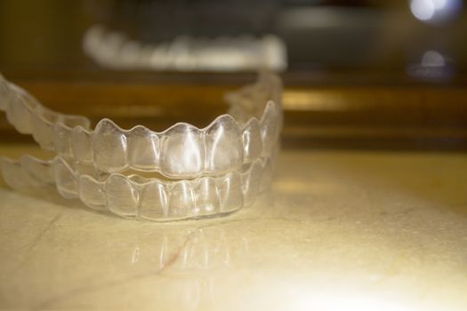 Invisible orthodontics to align the teeth