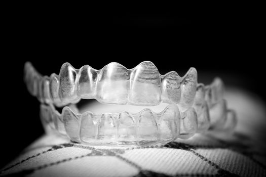 Invisible orthodontics to align the teeth