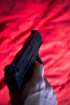 Gun held by a mans hand